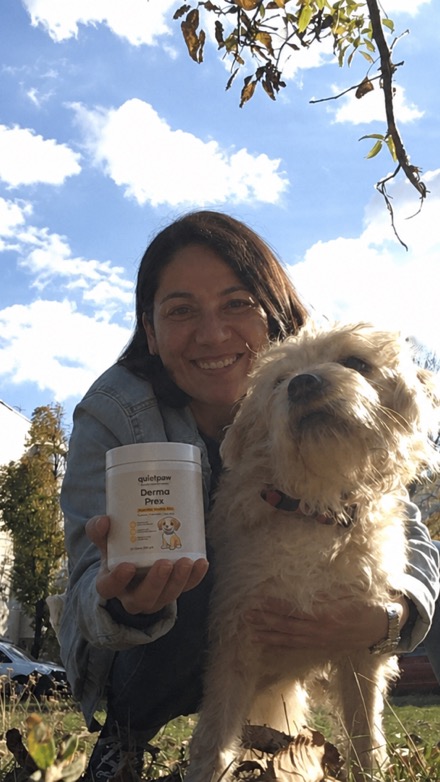 Dog enjoying QuietPaw chew