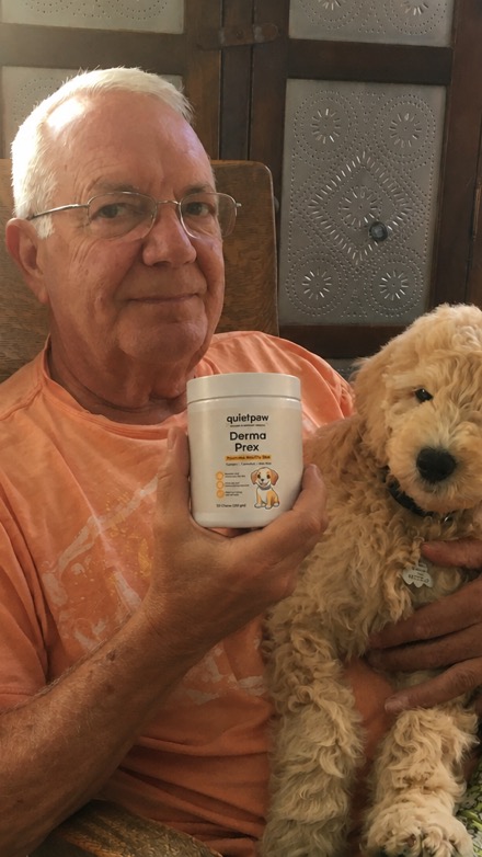 Dog enjoying QuietPaw chew